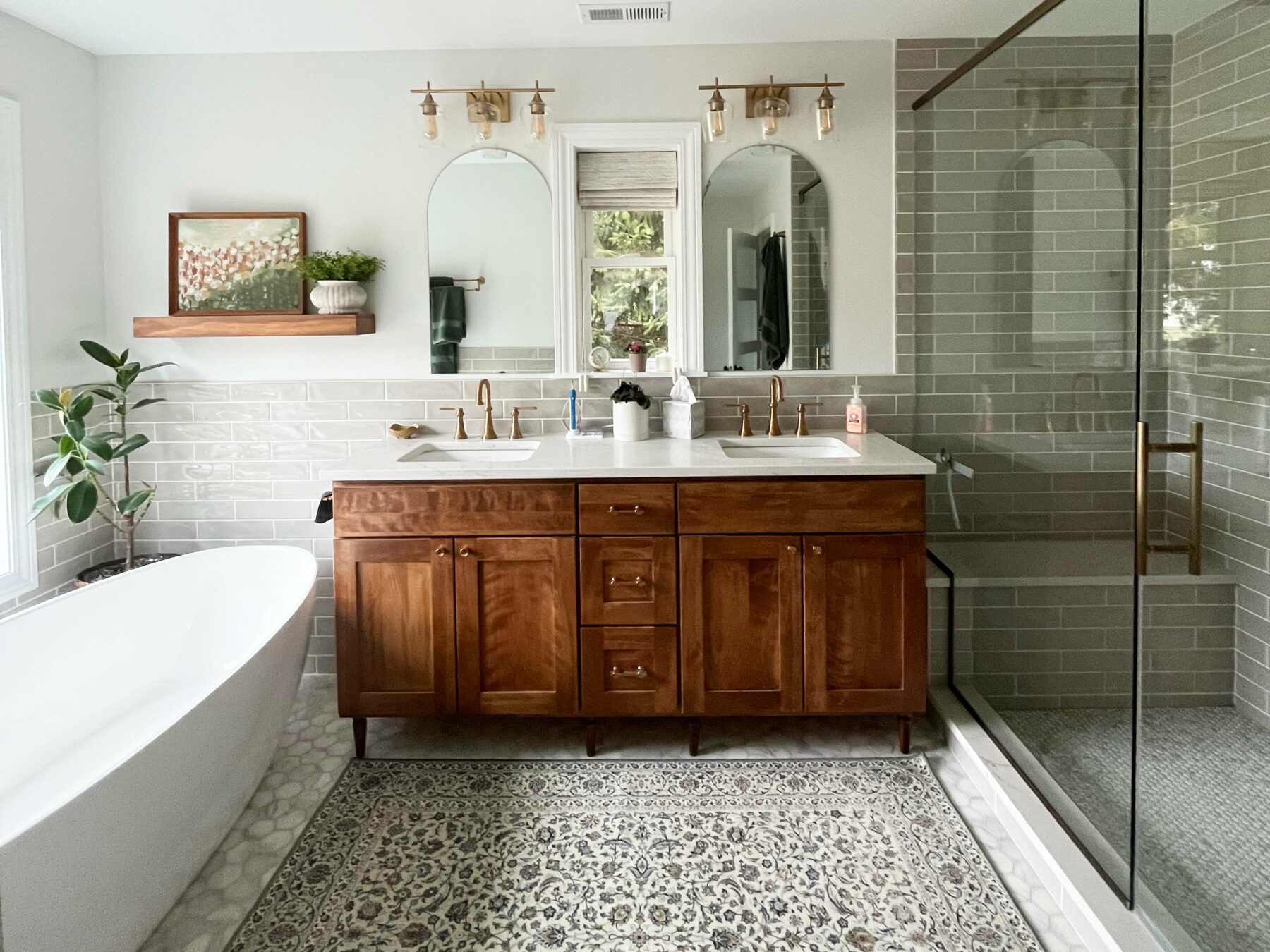Transitional style gives warmth to this bathroom remodel
