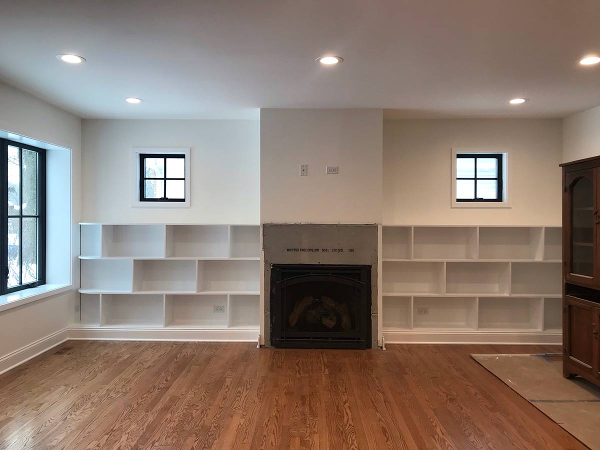 Custom fireplace makeover with bookcases