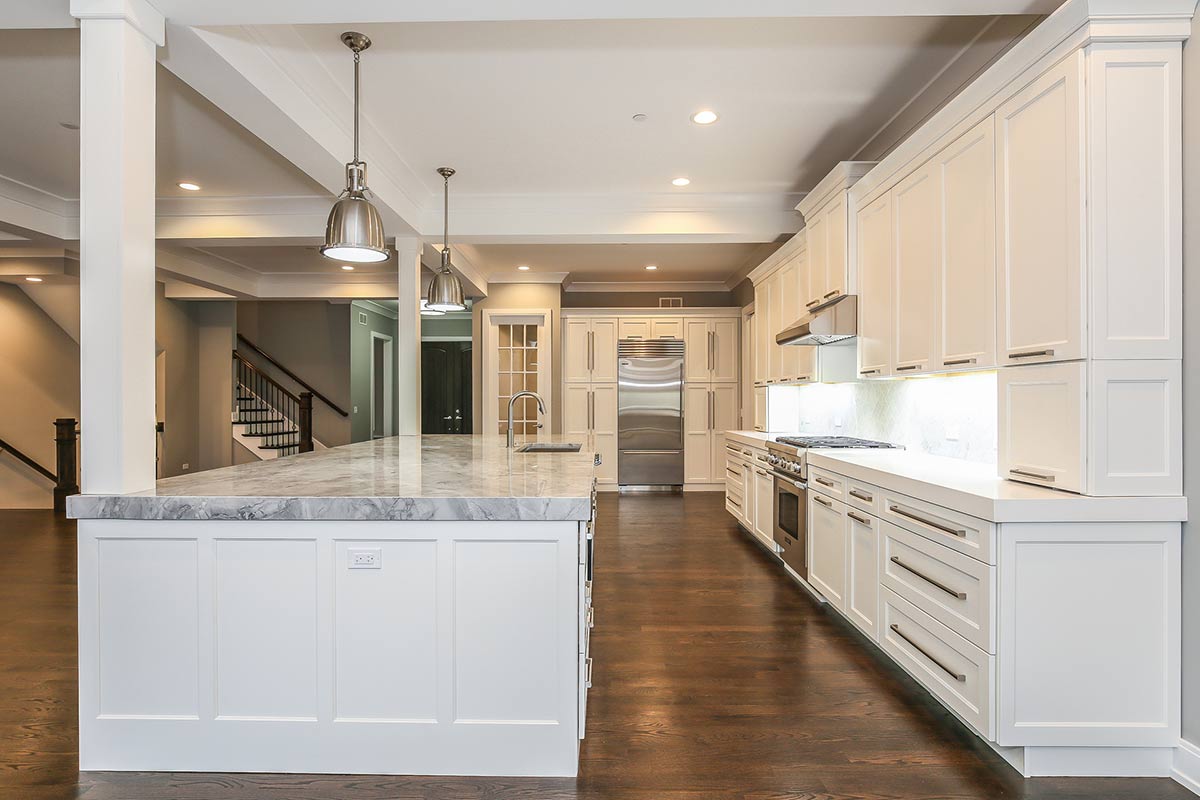 Custom white cabinets and marble counters