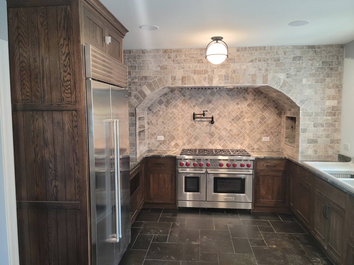 Stone tile wall in kitchen remodel